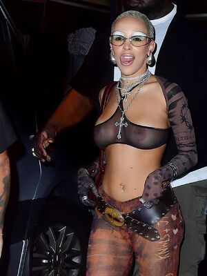 Doja Cat shows her nipples in a see thru bra at the Jean Paul Gaultier SSENSE Party